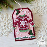 Handmade greeting tag with a sweater on it and warm winter wishes sentiment on it.