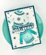 Handmade greeting card with sweaters on it with may your sweaters be ugly and bright sentiment on it.