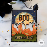 Handmade greeting card with pumpkins and graveyard on it with boo and trick or treat sentiments on it.