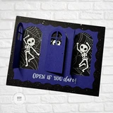 Handmade greeting card with skeletons on it and open if you dare sentiment on it.