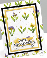 Handmade greeting card with flowers on it and with sympathy sentiment on it.