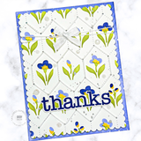 Handmade greeting card with flowers on it with thanks sentiment on it.