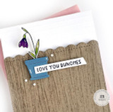 Handmade greeting card with flower on it and love you bunches sentiment on it.