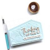 Handmade greeting card with hearts on it and thinking of you on your special day sentiments on it.