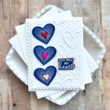Handmade greeting card of hearts and you melt my hearts sentiments on it with cardstock in background.