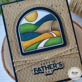 Handmade Father's Day card with Happy Father's Day sentiment at bottom and colorful Handmade greeting card with thinking of you sentiment with an arched window of rolling colorful hills and art supplies in background.rolling hills inside an arched window in middle of card.