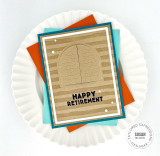 Handmade card with happy retirement sentiment and arched window with slates.