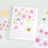 Handmade greeting card with flowers and leaves on it and a bumble bee with it's your day sentiment on it.