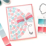 Handmade greeting card with dragon fly on it with thank you sentiment on it.