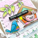 Handmade greeting card with two doodle birds in a birdhouse with home tweet home sentiment.