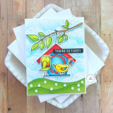 Handmade greeting card with doodle birds in birdhouse with you're so tweet sentiment with cards in background.