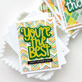 A handmade greeting card with you're the best sentiment and additional cards in background.