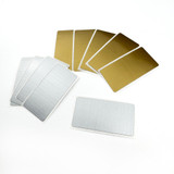 Five gold and white labels used for jackpot die and clear stamp combo for paper crafting.