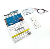 Packaging of twinkling lights and two buttons to press to light up card for paper crafting.