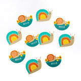 10 snail themed envelope seal stickers with some having hello sentiment on them.