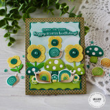 Handmade greeting card with snails, flowers, and mushrooms with sorry I'm slow... Happy belated birthday sentiment on it with mushrooms and snails in background.