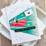 Handmade greeting card with dog and bird in airplane with beams of light and happy mail just for you sentiment on it.
