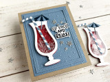 Handmade greeting card with a drink cup and stars that has sip back and relax sentiment on it with paper crafted drink cup in background.