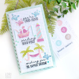 Handmade greeting card with beach theme including crab, palm trees, and sailboat with three different sentiments on it wishing happy birthday with color swatches in background.