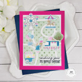 Handmade greeting card that is carnival themed with wishing you the happiest birthday sentiment on it with cardstock in background.