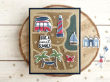 Handmade greeting card with a beach theme including a crab and sailboat with have a sweet summer sentiment on it and a paper crafted beach house in the background.
