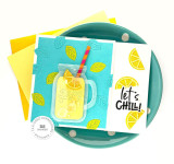 Handmade greeting card with a drink cup, citrus fruit, and let's chill sentiment on it with cardstock in the background.