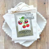 Handmade greeting card with tomatoes on it with wishing you a beautiful summer sentiment on it with cardstock in background. Handmade greeting card with tomatoes on it with wishing you a beautiful summer sentiment on it with cardstock in background.