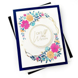 Handmade greeting card with circle of flowers and get well soon sentiment on it with cardstock in background. Handmade greeting card with circle of flowers and get well soon sentiment on it with cardstock in background.