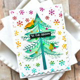 Handmade greeting card with tree on it and a dove with tis the season sentiment on it.