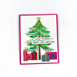 Handmade greeting card with tree on it with ornaments and presents underneath with have yourself a merry little christmas sentiment on it.