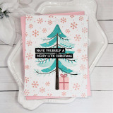 Handmade greeting card with tree on it and ornaments with present underneath and have yourself a merry little christmas sentiment on it.