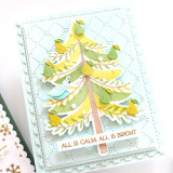 Handmade greeting card with tree on it with pears and a dove and all is calm, all is bright sentiment on it.