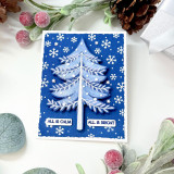 Handmade greeting card with blue tree on it and all is calm all is bright sentiment on it.