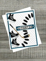 Handmade greeting card with hockey skates on it, pucks, and a hockey stick with go fight sentiment on it. Handmade greeting card with hockey skates on it, pucks, and a hockey stick with go fight sentiment on it.