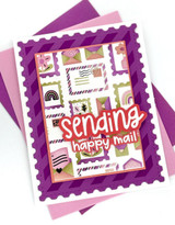 Handmade greeting card with postage stamps on it and envelopes with sending happy mail sentiment on it.