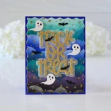 Handmade greeting card with ghosts and bats on it with trick or treat sentiment on it.