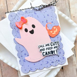Handmade greeting card with a ghost on it holding a pumpkin basket and call me cute and feed me candy sentiment on it.