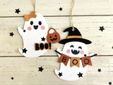 Two handmade greeting tags with ghosts on them with boo sentiments on each.