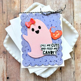 Handmade greeting card with a ghost on it holding a pumpkin basket and call me cute and feed me candy sentiment on it.