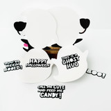 Three handmade ghost gift tags with halloween sentiments on them.