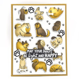 Handmade greeting card with dogs and paw prints on it with may your heart be light and happy sentiment on it.