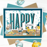 Handmade greeting card with dogs on it and happy birthday sentiment on it.