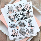 Handmade greeting card with cats on it and toys with sending paw-sitive vibes sentiment on it.