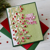 Handmade greeting card with mistletoe on it and may your days be merry and bright sentiment on it.