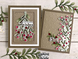 Two handmade greeting cards with mistletoes on each and christmas wishes sentiment on one and noel sentiment on the other.