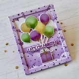 Handmade greeting card with balloons holding a present up with let's celebrate sentiment on it. Handmade greeting card with balloons holding a present up with let's celebrate sentiment on it.