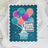 Handmade greeting card with balloons holding up a present on it with happy, happy, happy birthday sentiment on it.