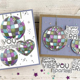 Two handmade greeting cards with disco balls on each with one having you sparkle sentiment on it and the other having in your disco era sentiment on it.