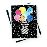 Handmade greeting card with balloons holding a present up on it with happy birthday to you sentiment on it. Handmade greeting card with balloons holding a present up on it with happy birthday to you sentiment on it.