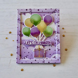Handmade greeting card with balloons holding a present up on it with let's celebrate sentiment on it. Handmade greeting card with balloons holding a present up on it with let's celebrate sentiment on it.